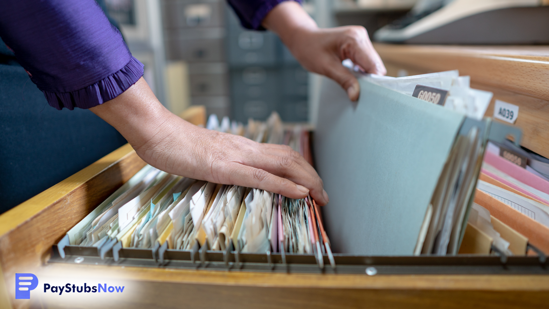A person sorting through files